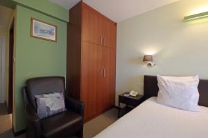 Postel nebo postele na pokoji v ubytování Hotel Uilenspiegel