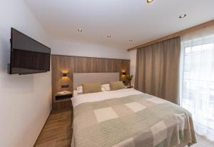 Łóżko lub łóżka w pokoju w obiekcie Lenni´s Apartments