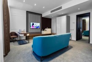 TV a/nebo společenská místnost v ubytování Ivy Garden Hotel Baku
