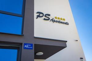 a sign on the side of a building at PS Apartments in Pula