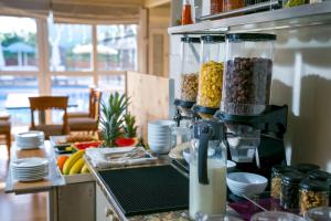 a kitchen with a bunch of food on a counter at Fitosinn Hotel in Paphos