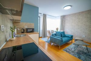 Kuchyň nebo kuchyňský kout v ubytování Kedar apartment