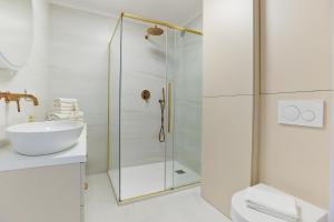 Kúpeľňa v ubytovaní M&K Apartamenty Sailors Golden Yacht, Gdańsk - Wyspa Sobieszewska