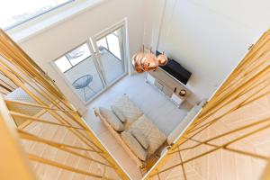 Posteľ alebo postele v izbe v ubytovaní M&K Apartamenty Sailors Golden Yacht, Gdańsk - Wyspa Sobieszewska