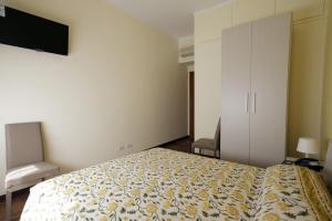 Postel nebo postele na pokoji v ubytování Italy Inn