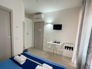 TV a/nebo společenská místnost v ubytování Residenza Borgo Trento SUNDAY