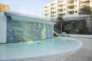 Bazén v ubytování Ocean Garden Playa Paraiso nebo v jeho okolí