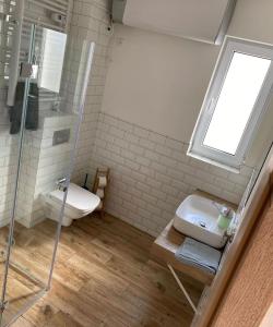 Koupelna v ubytování Apartamenty Łebska Ostoja