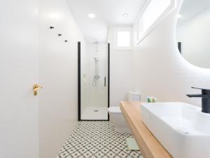 A bathroom at Pasitoblanco Porto Mare 7 Seaview Villa private heated pool