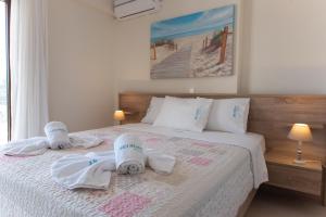 Letto o letti in una camera di Ariadni -Villas- luxury houses