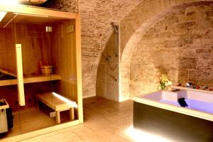 Kúpele alebo wellness v ubytovaní Rubis Relais & SPA