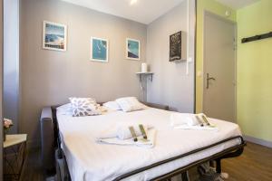 Postel nebo postele na pokoji v ubytování Nice cozy studio close to the city-center - Biarritz - Welkeys