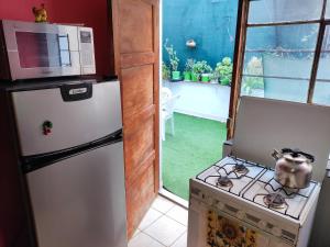 Virtuvė arba virtuvėlė apgyvendinimo įstaigoje Samayuna Wasi , entire apartment Cusco