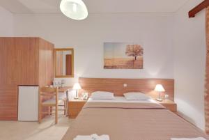 Postel nebo postele na pokoji v ubytování Marirena Hotel + 32 fotografií