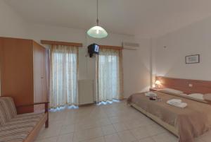 Posteľ alebo postele v izbe v ubytovaní Marirena Hotel
