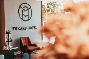 Posezení v ubytování The Aru Hotel at Aru Suites