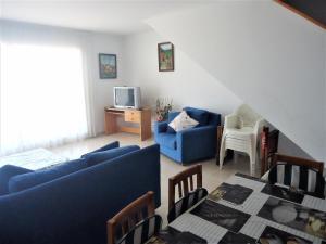 TV a/nebo společenská místnost v ubytování Arabella duplex village