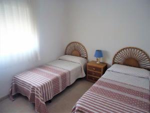 Postel nebo postele na pokoji v ubytování Arabella duplex village + 31 fotografií