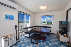 TV a/nebo společenská místnost v ubytování UMITOHOSI