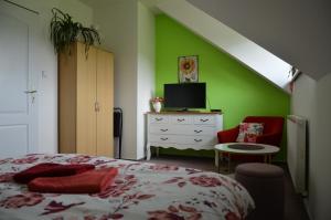 Ein Bett oder Betten in einem Zimmer der Unterkunft Penzion Aura