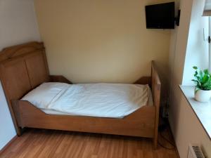 Säng eller sängar i ett rum på Bremer Handelshaus Fremdenzimmer