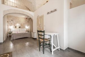Posteľ alebo postele v izbe v ubytovaní La Casa nel Vico Pretty Apartment + 9 fotografií