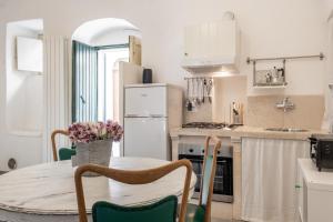 Kuchyňa alebo kuchynka v ubytovaní La Casa nel Vico Pretty Apartment