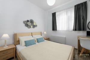 Postel nebo postele na pokoji v ubytování Villa Eurycleia - AKTI homes