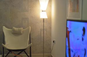 TV a/nebo společenská místnost v ubytování Rafa Homes - Al Falah