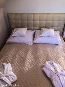 Łóżko lub łóżka w pokoju w obiekcie Villa Park