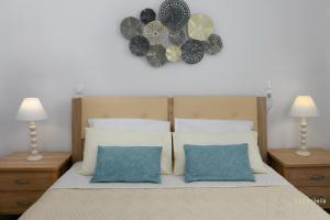 Postel nebo postele na pokoji v ubytování Villa Eurycleia - AKTI homes