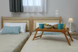 Postel nebo postele na pokoji v ubytování Villa Eurycleia - AKTI homes