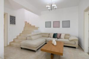 Posezení v ubytování Villa Eurycleia - AKTI homes
