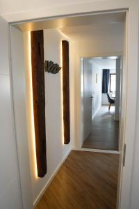 a hallway with a mirror in a room at Hänsel und Gretel in Dinkelsbühl