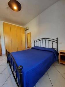 Postel nebo postele na pokoji v ubytování Hotel Villa del Mare Solanas