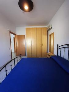 Postel nebo postele na pokoji v ubytování Hotel Villa del Mare Solanas