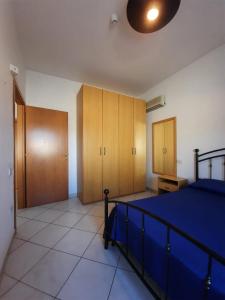 Postel nebo postele na pokoji v ubytování Hotel Villa del Mare Solanas