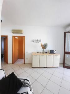 Kuchyň nebo kuchyňský kout v ubytování Hotel Villa del Mare Solanas