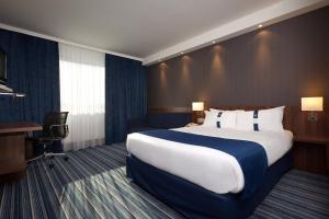 Postel nebo postele na pokoji v ubytování Holiday Inn Express Strasbourg - Sud by IHG