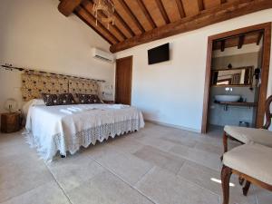 Postel nebo postele na pokoji v ubytování Agriturismo Giù al Pozzo