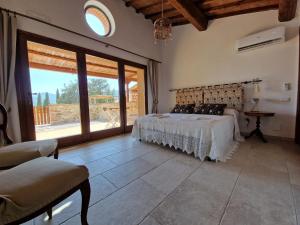 Postel nebo postele na pokoji v ubytování Agriturismo Giù al Pozzo