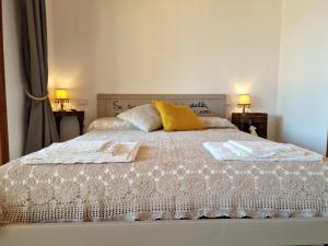 Postel nebo postele na pokoji v ubytování Agriturismo Giù al Pozzo