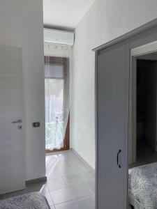 A bed or beds in a room at Casa vacanza Ferrara IUN P5547