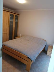 Cama o camas de una habitación en Apartman Vulsa 3