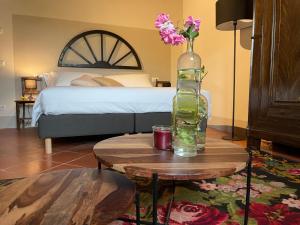 Postel nebo postele na pokoji v ubytování Casale La Gora - B&B di charme