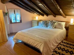 A bed or beds in a room at Casa Artista