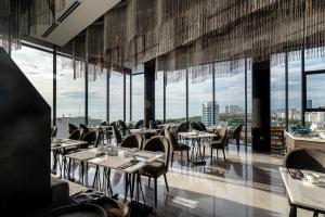 Un restaurant sau alt loc unde se poate mânca la Draco Hotel & Suites