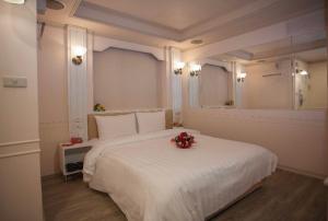 Voodi või voodid majutusasutuse Showart Hotel toas