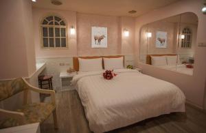 Voodi või voodid majutusasutuse Showart Hotel toas