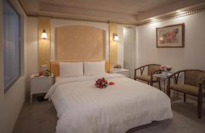 Voodi või voodid majutusasutuse Showart Hotel toas